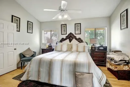 a bedroom with bed and window