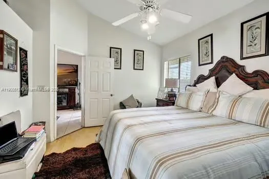 a bedroom with a bed and a walk in closet