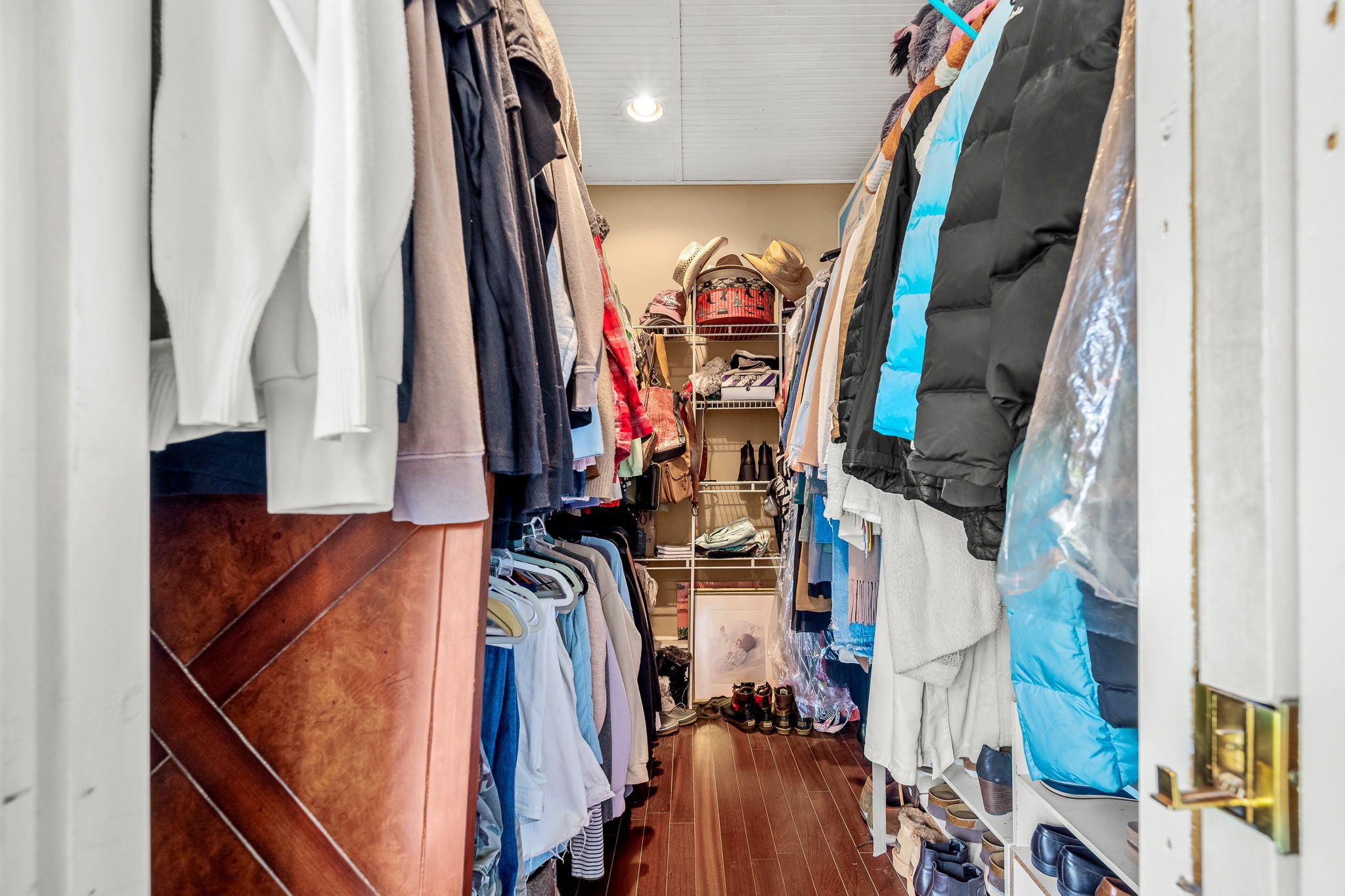 202 High Street Bell Buckle, TN 37020 - Photo 62 of 93 a view of walk in closet with clothes and shoes