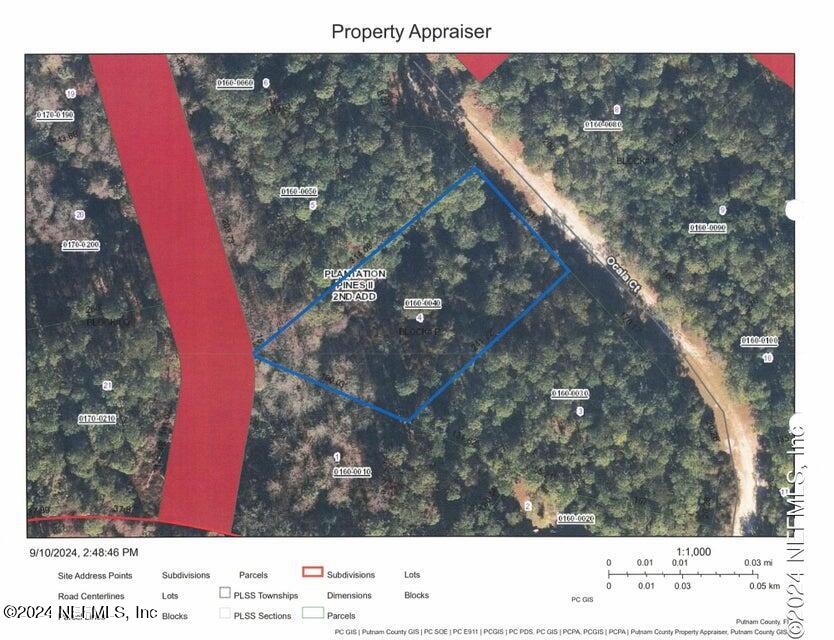 209 Ocala Court Georgetown, FL 32139 - Photo 6 of 7 a black and white photo of a book