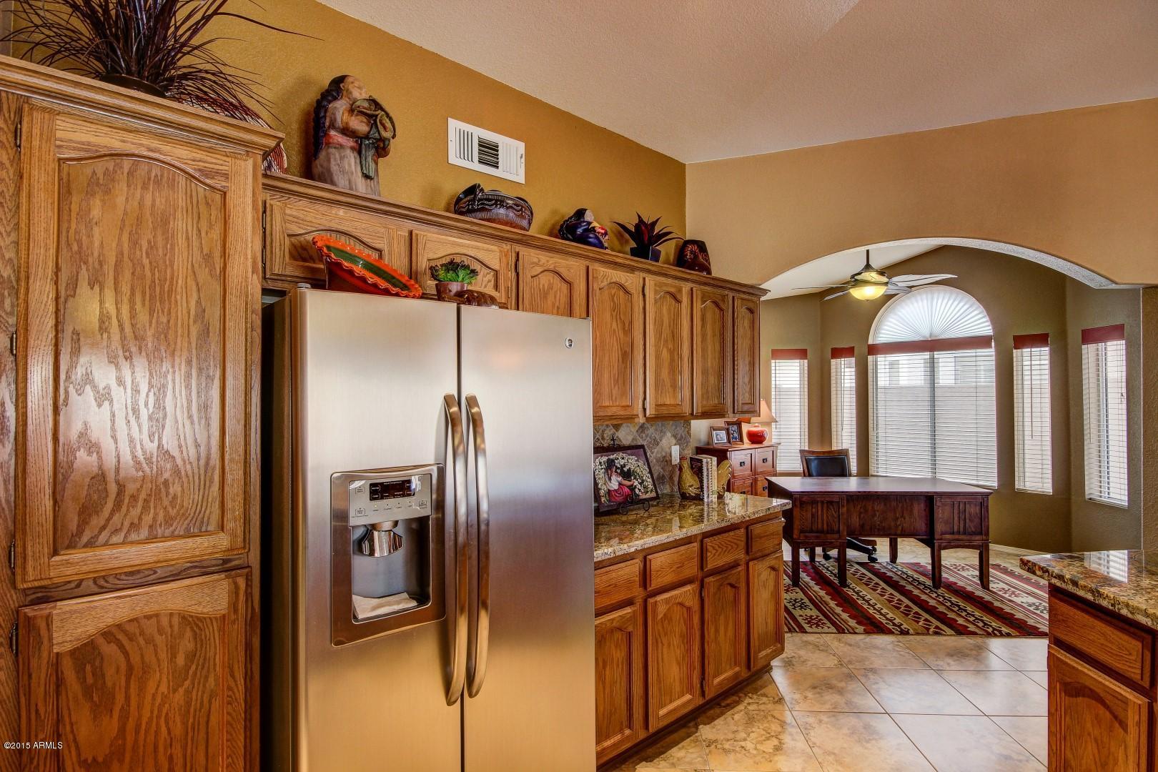 15504 Piccadilly Road Goodyear, AZ 85395 - Photo 17 of 49 Cabinetry With Crown Molding