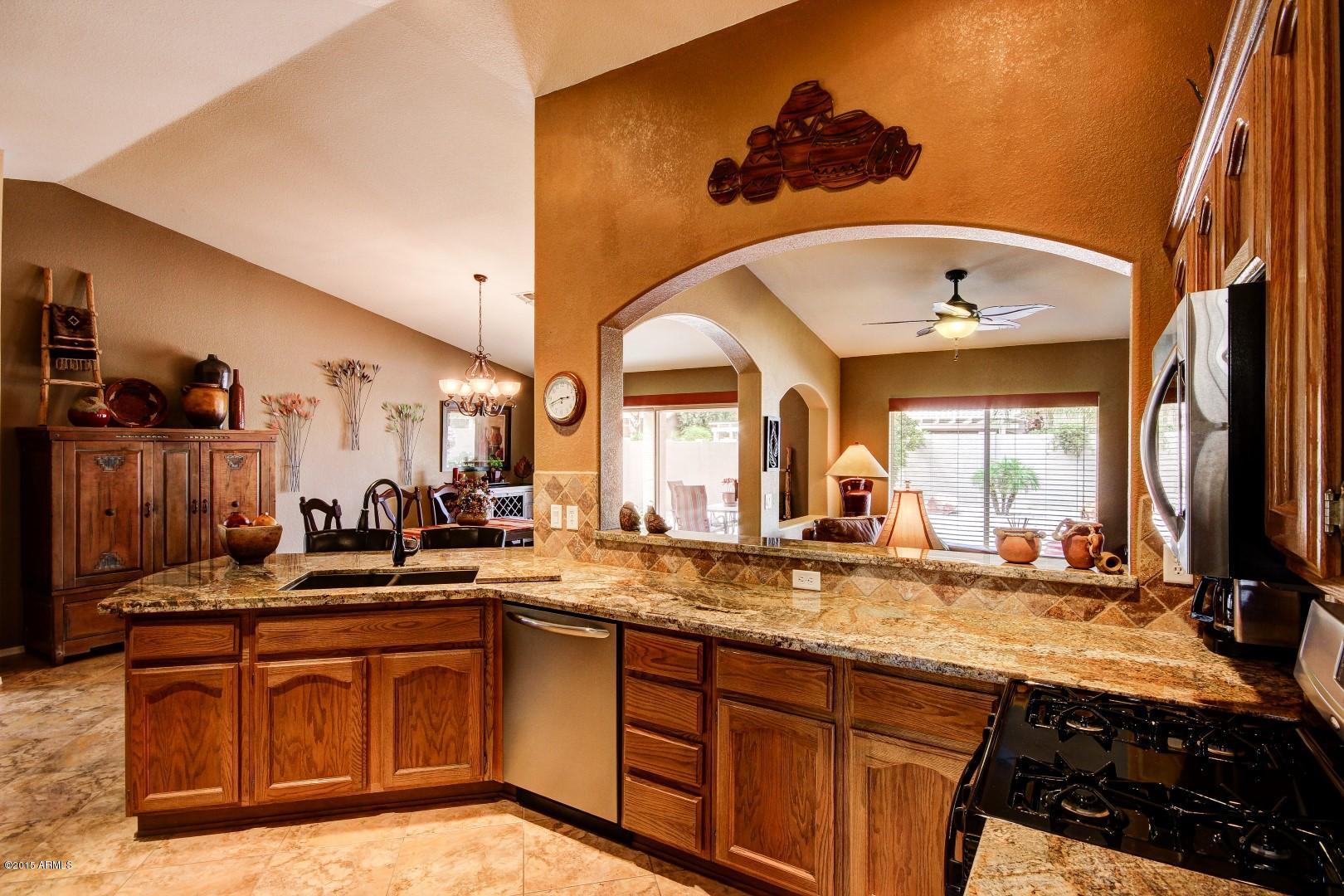 15504 Piccadilly Road Goodyear, AZ 85395 - Photo 18 of 49 Opening to Great Room