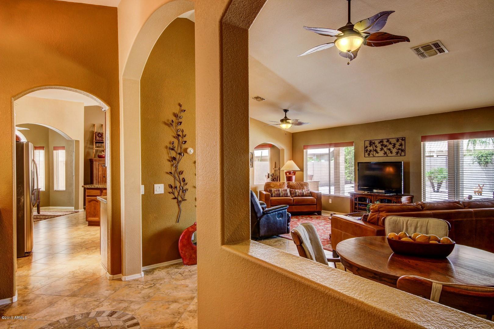 15504 Piccadilly Road Goodyear, AZ 85395 - Photo 9 of 49 Open Great Room_Arched Doorways