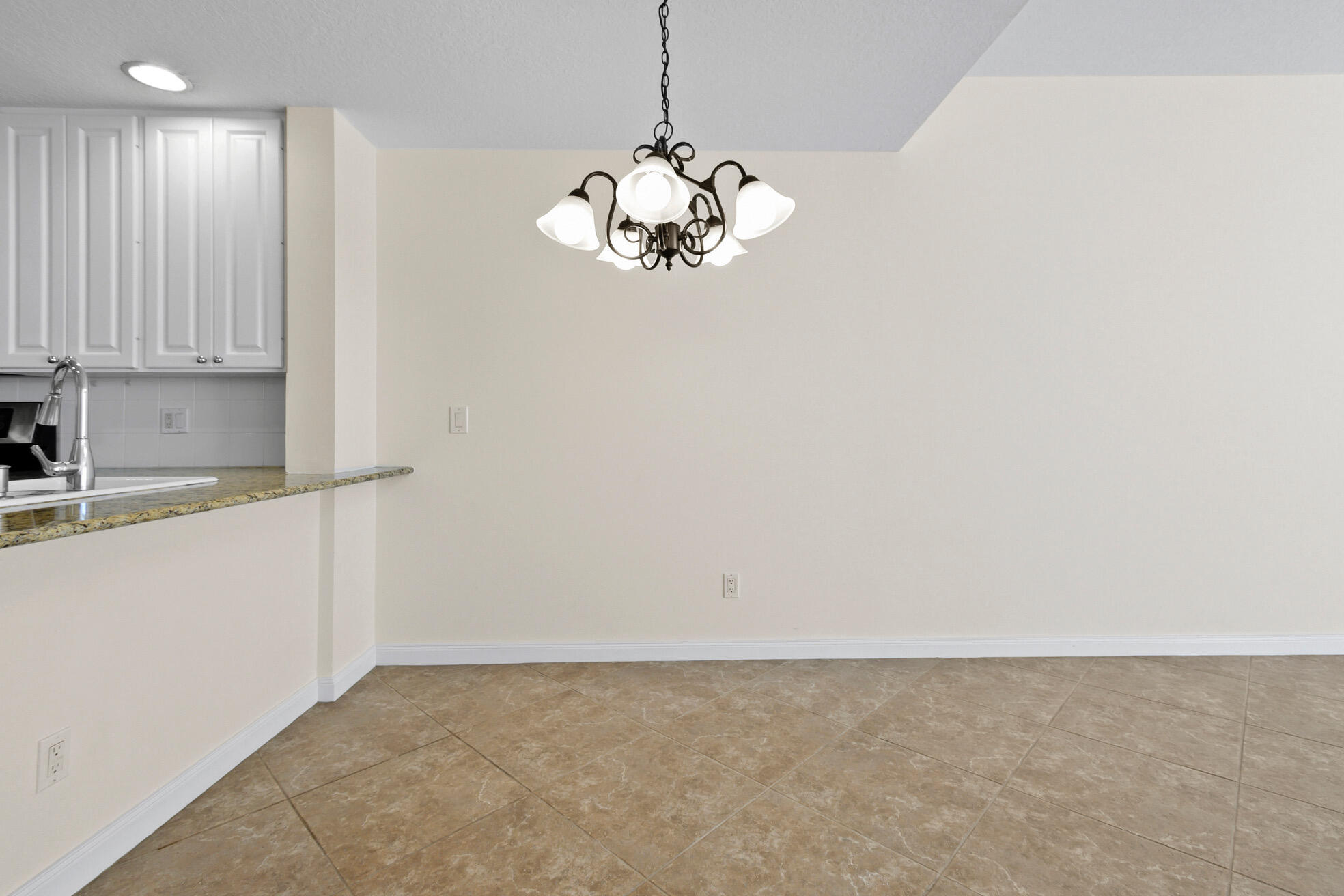1836 Jeaga Drive Jupiter, FL 33458 - Photo 5 of 25 a view of an empty room with a window