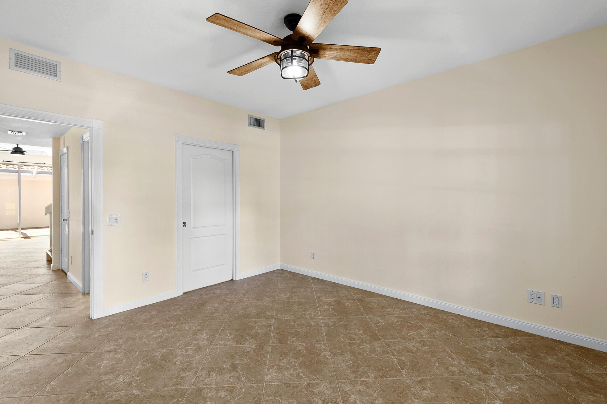 1836 Jeaga Drive Jupiter, FL 33458 - Photo 8 of 25 a view of a big room with carpet