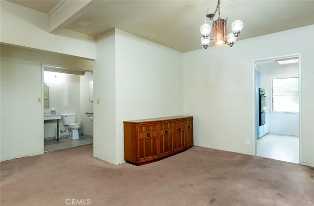 a room with furniture and a window