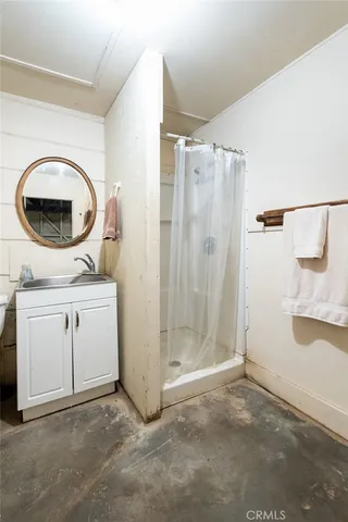 an aerial view of residential building with parking