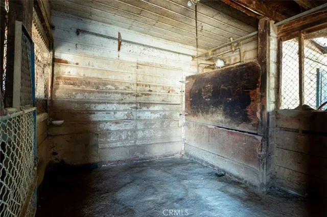 an aerial view of residential houses with city view