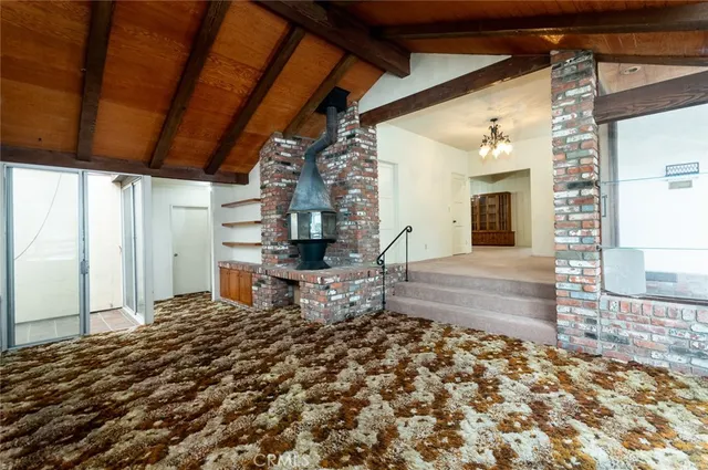 a living room with a couch and a rug