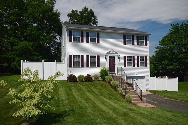 22 Pheasant Drive Springfield, MA 01119 - Photo 1 of 28 a front view of a house with a yard