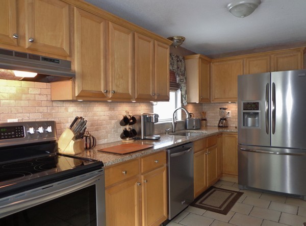 22 Pheasant Drive Springfield, MA 01119 - Photo 13 of 28 a kitchen with a sink appliances and cabinets