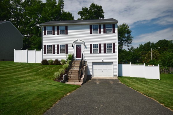 22 Pheasant Drive Springfield, MA 01119 - Photo 28 of 28 a front view of a house with a yard
