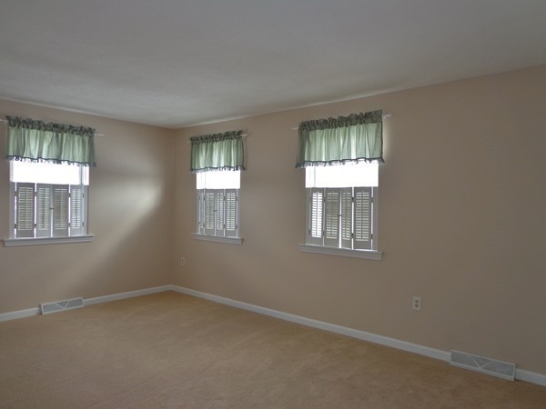 22 Pheasant Drive Springfield, MA 01119 - Photo 9 of 28 an empty room with a window