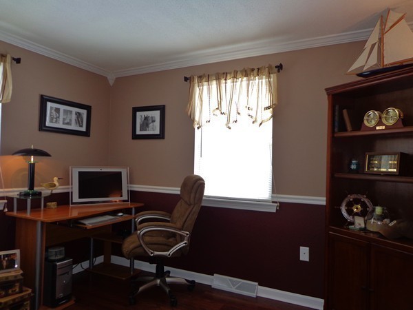 22 Pheasant Drive Springfield, MA 01119 - Photo 10 of 28 a view of a workspace with furniture and a window