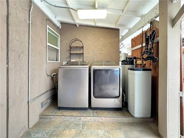 a view of a kitchen with a sink