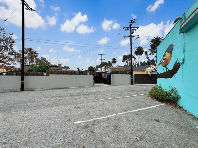 a front view of a house with a yard balcony
