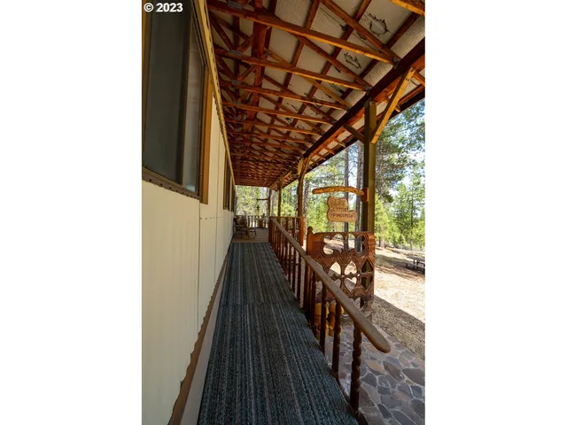 a view of swimming pool with a patio