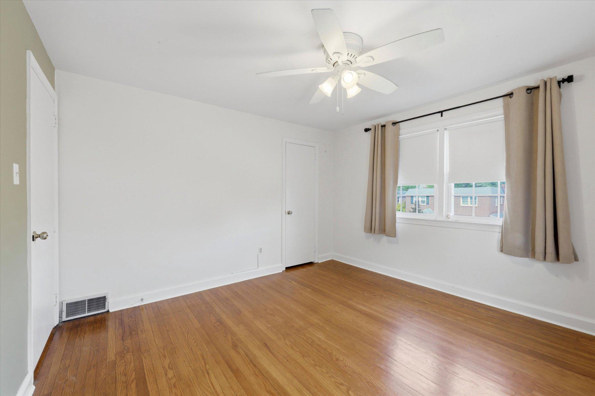 615 Michell Street Ridley Park, PA 19078 - Photo 11 of 25 wooden floor in an empty room with a window