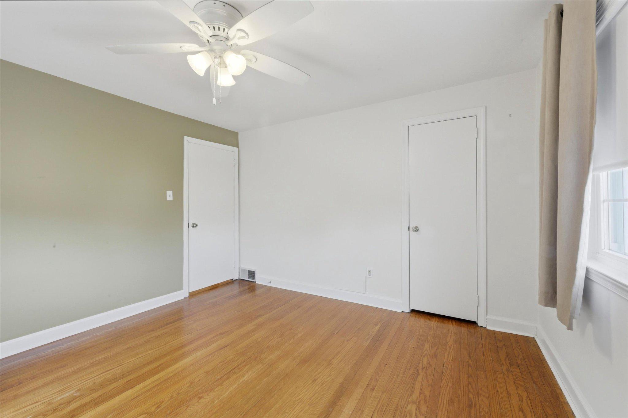 615 Michell Street Ridley Park, PA 19078 - Photo 12 of 25 wooden floor in an empty room with a window