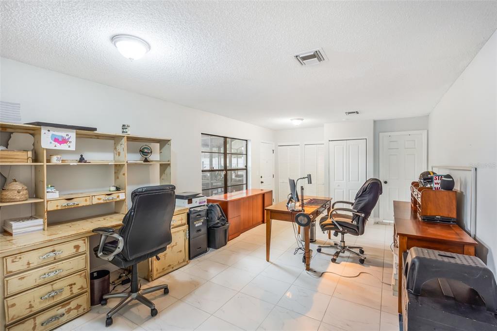 1760 12th Street Clermont, FL 34711 - Photo 24 of 42 a view of a workspace with furniture