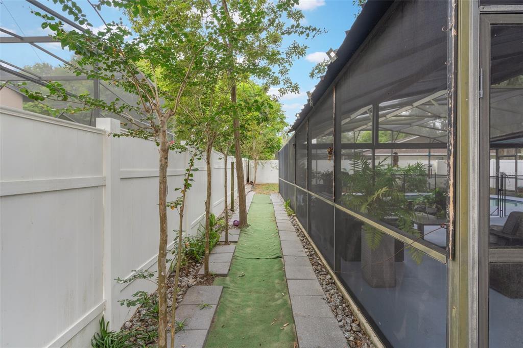 1760 12th Street Clermont, FL 34711 - Photo 37 of 42 a view of a pathway of a balcony