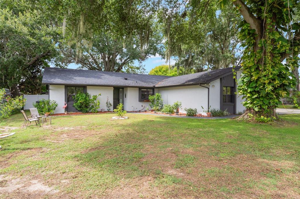 1760 12th Street Clermont, FL 34711 - Photo 5 of 42 a front view of house with yard and green space