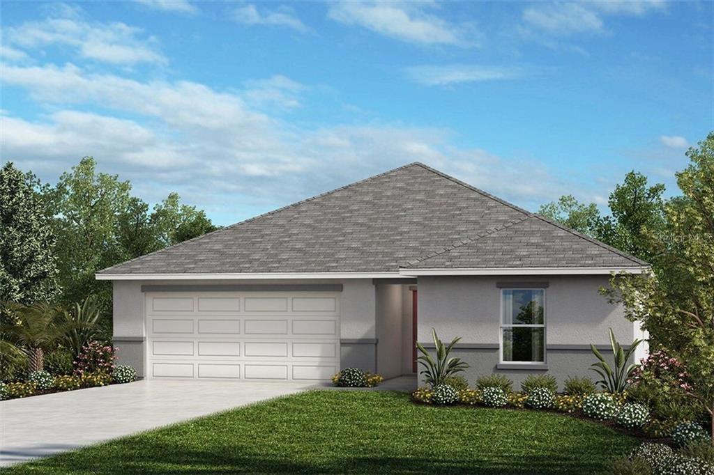 13742 Rushing Creek Run Orlando, FL 32824 - Photo 1 of 1 a front view of a house with a yard