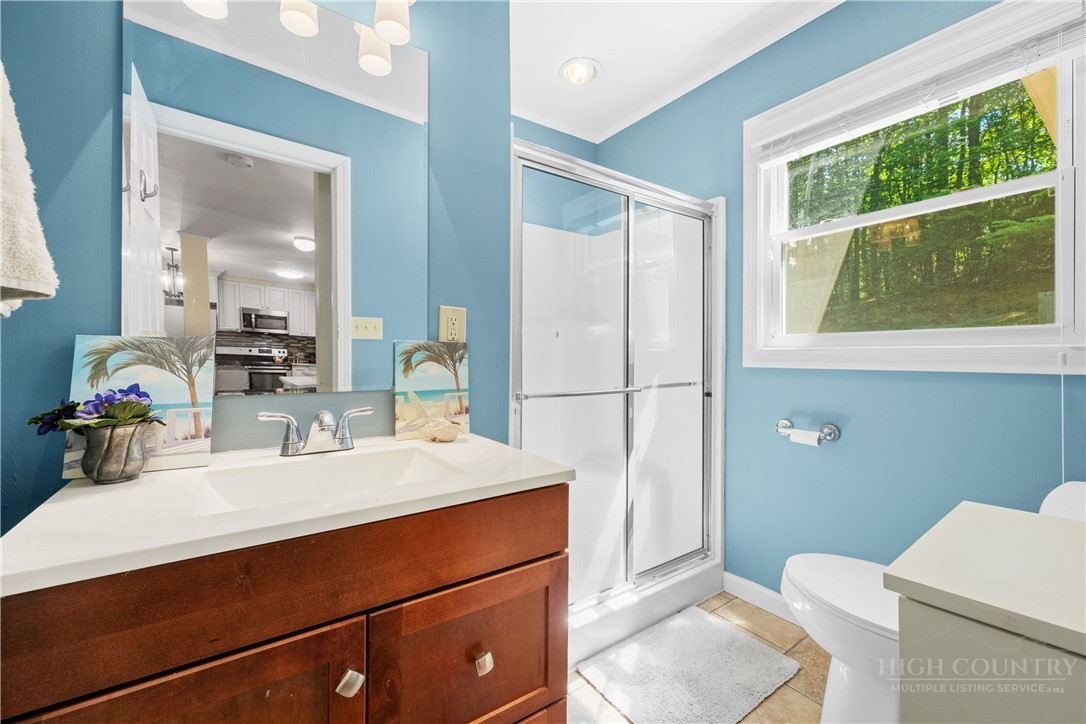 467 Horseshoe Ridge Road East Deep Gap, NC 28618 - Photo 7 of 46 a bathroom with a sink and a mirror