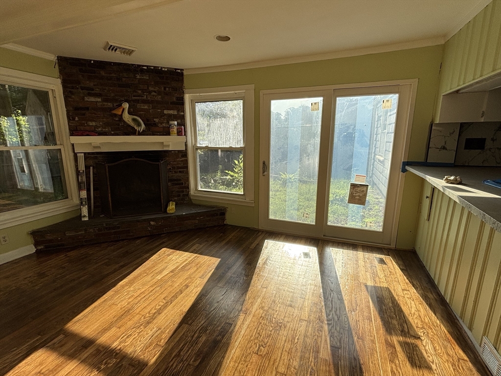 215 Jaffrey Street, Unit 1 Weymouth, MA 02188 - Photo 3 of 8 a view of a fireplace in the room