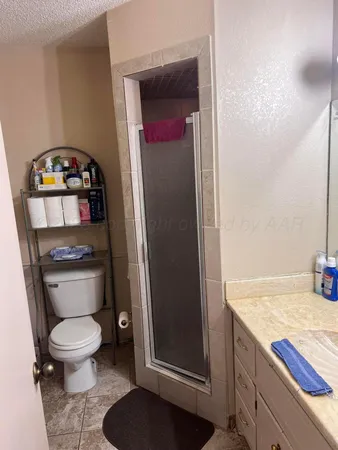 a bathroom with a toilet and a sink