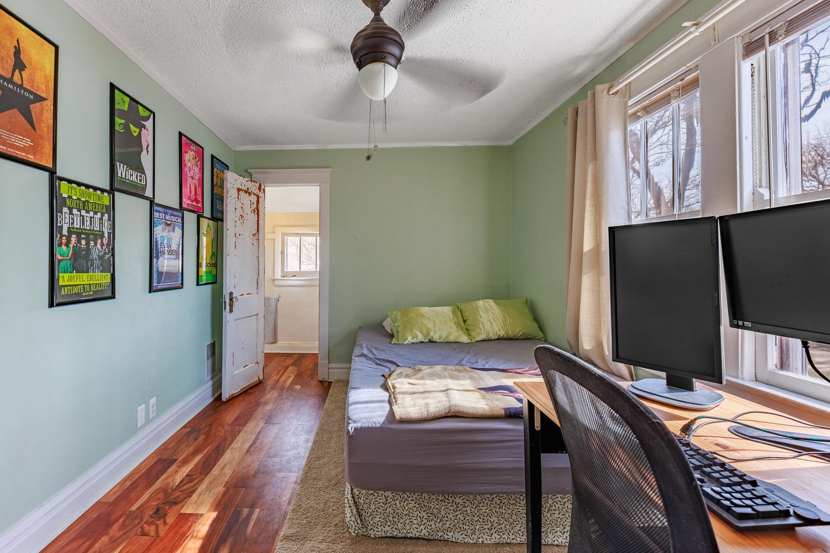 410 Repton Road Riverside, IL 60546 - Photo 12 of 30 a bedroom with furniture and a flat screen tv