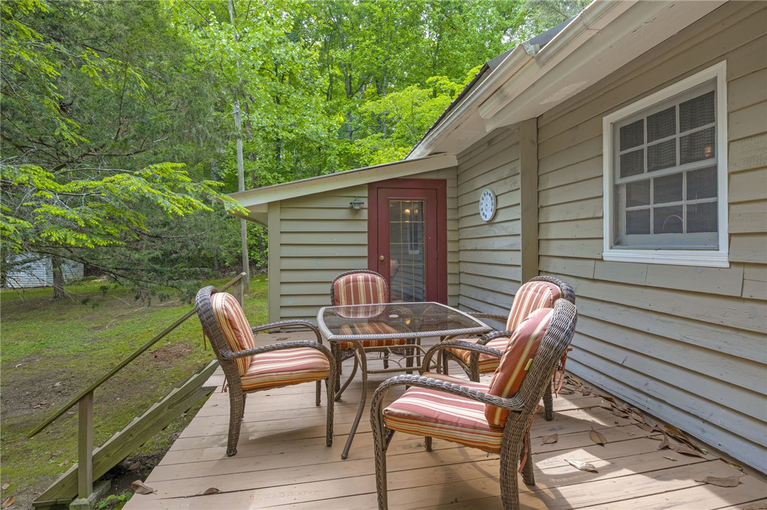 437 West Gate Road Pickens, SC 29671 - Photo 15 of 47 This private outdoor space offers a serene retreat with a charming deck for leisure and entertainment.