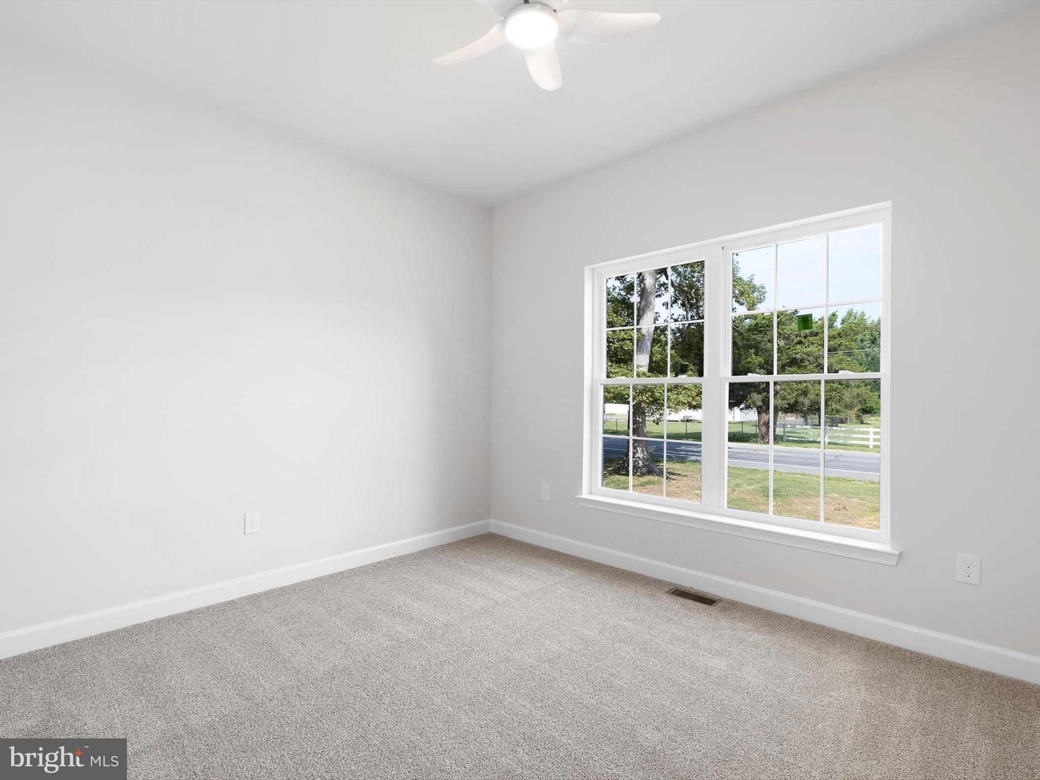 154 Pine Tree Road Townsend, DE 19734 - Photo 27 of 33 an empty room with a window