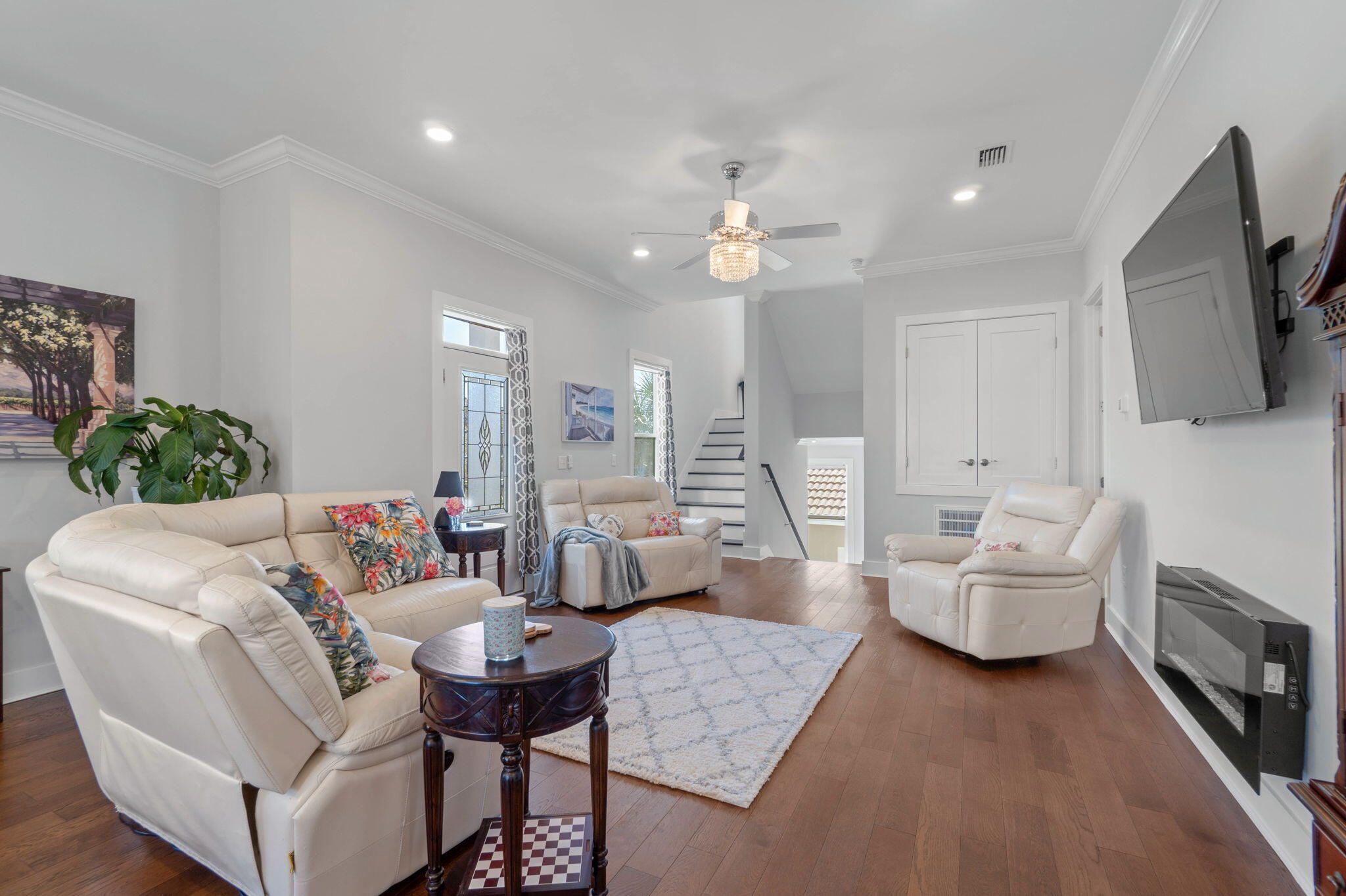 234 Inverrary Drive Destin, FL 32541 - Photo 11 of 53 a living room with fireplace furniture and a flat screen tv