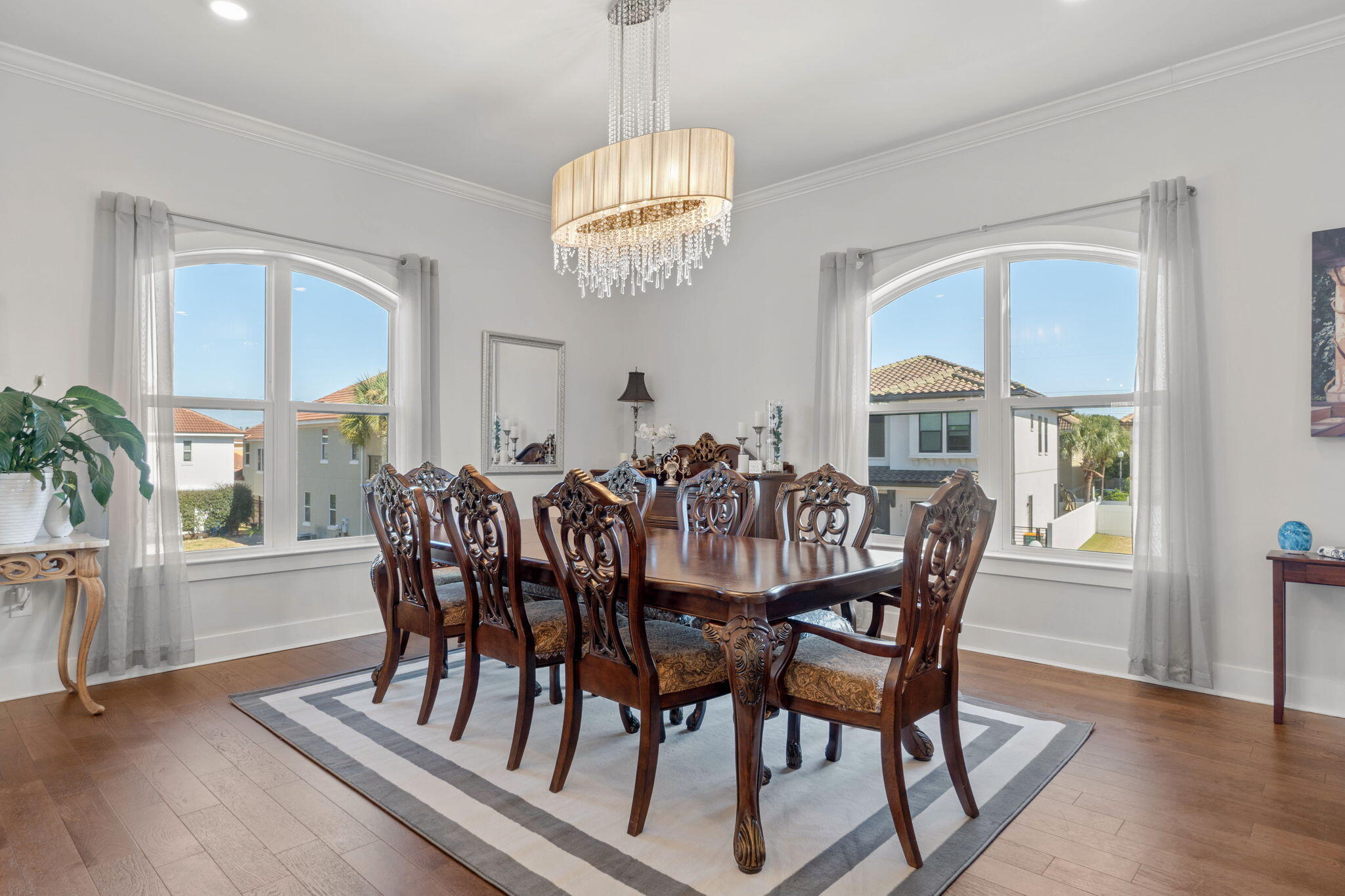 234 Inverrary Drive Destin, FL 32541 - Photo 12 of 53 a view of a dining room with furniture window and wooden floor