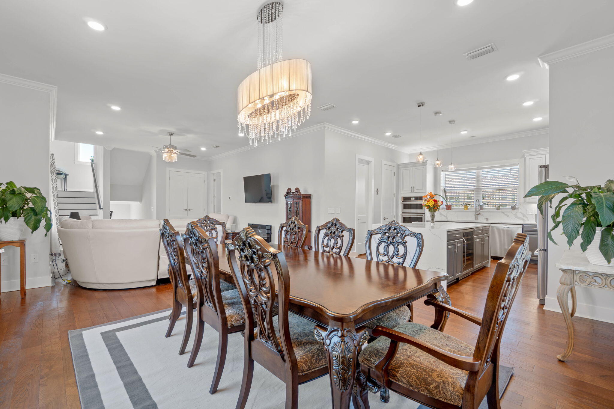 234 Inverrary Drive Destin, FL 32541 - Photo 14 of 53 a view of a dining room with furniture and wooden floor