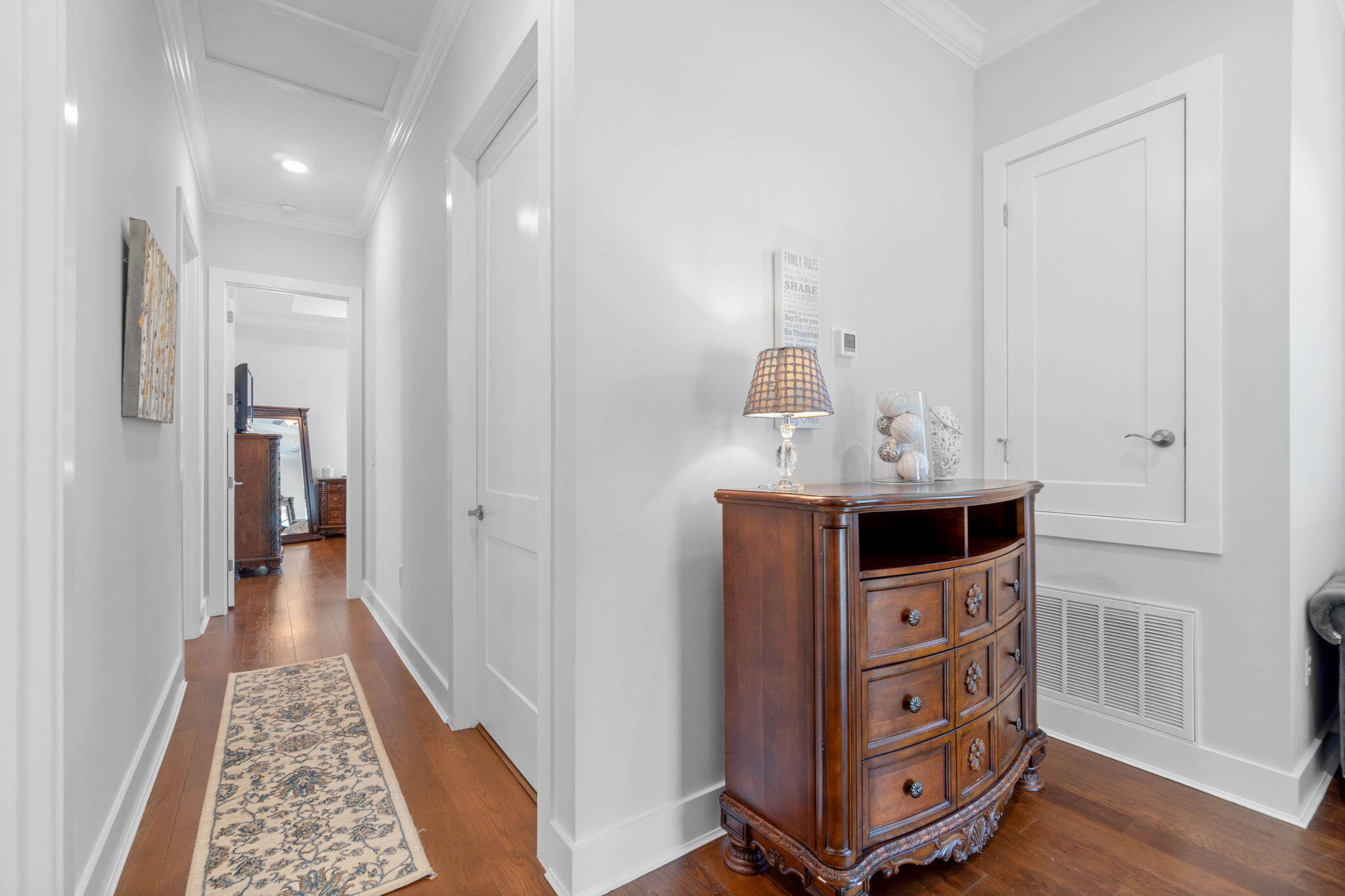 234 Inverrary Drive Destin, FL 32541 - Photo 23 of 53 a view of hallway with closet and wooden floor