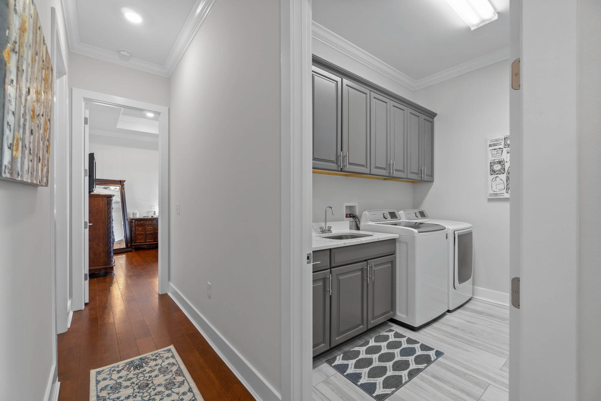 234 Inverrary Drive Destin, FL 32541 - Photo 24 of 53 a view of a storage & utility room with a sink
