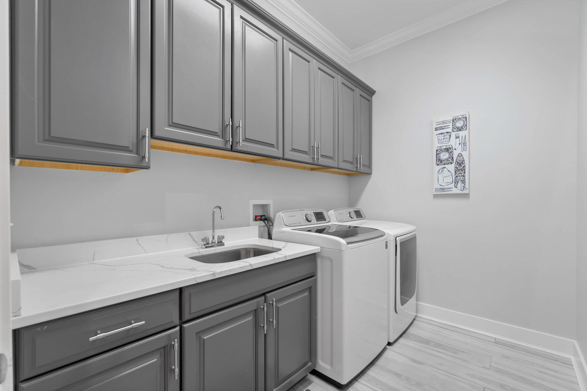 234 Inverrary Drive Destin, FL 32541 - Photo 25 of 53 a utility room with sink dryer and washer