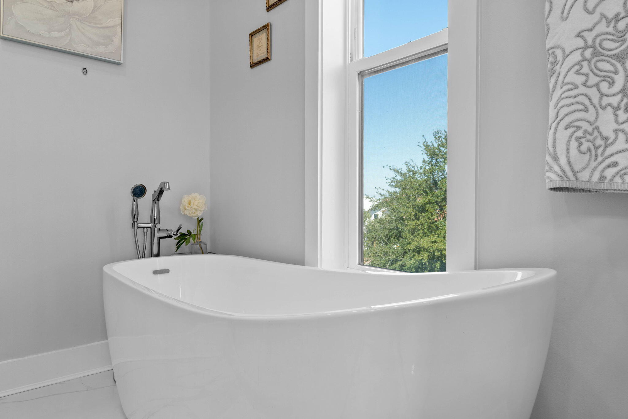 234 Inverrary Drive Destin, FL 32541 - Photo 30 of 53 a white bath tub sitting in a bathroom