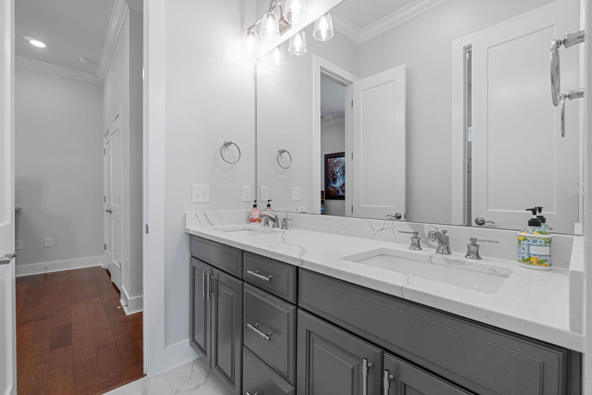 234 Inverrary Drive Destin, FL 32541 - Photo 36 of 53 a bathroom with a sink double vanity and a mirror