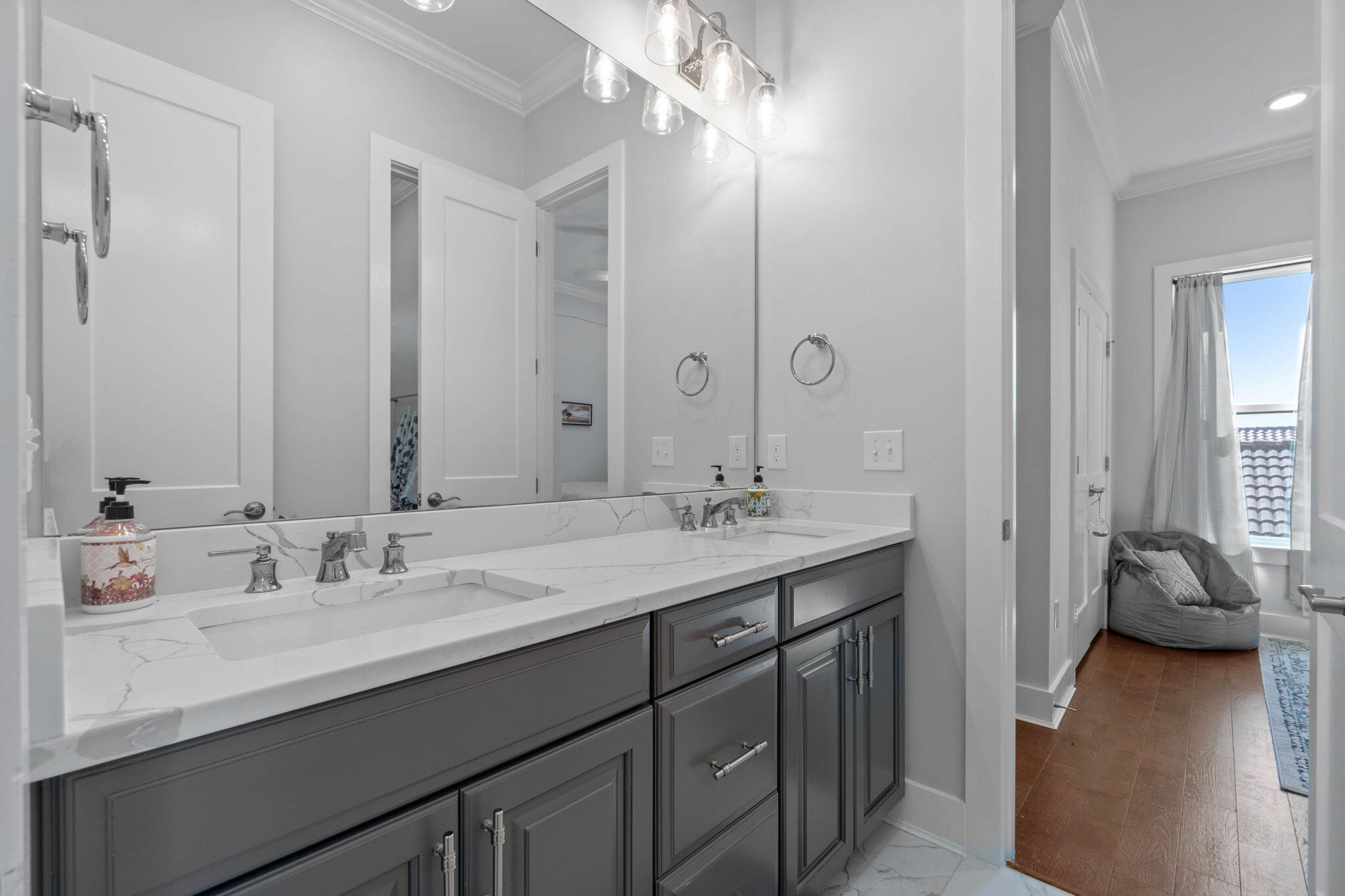 234 Inverrary Drive Destin, FL 32541 - Photo 37 of 53 a en suite bathroom with a sink double vanity and a mirror