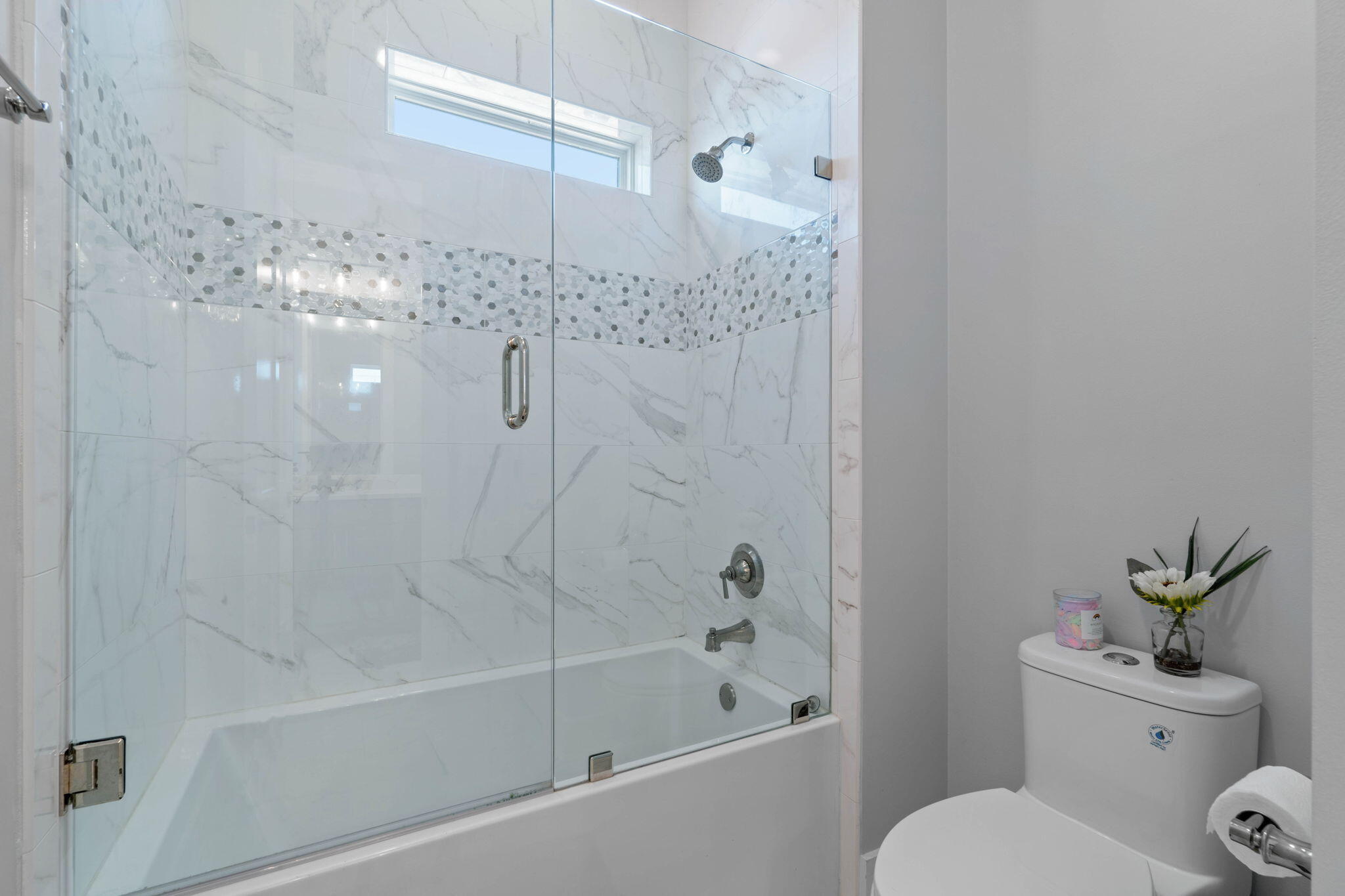 234 Inverrary Drive Destin, FL 32541 - Photo 38 of 53 a bathroom with a shower a toilet and a bathtub