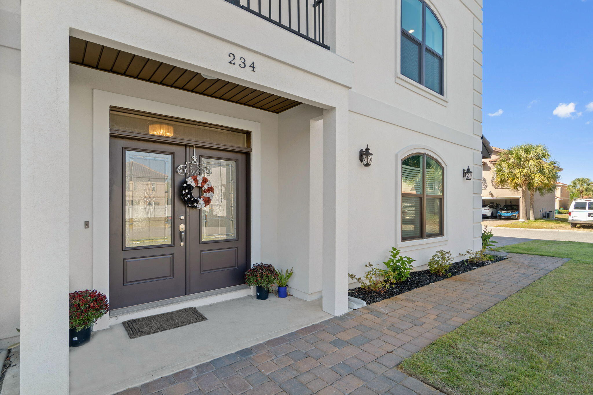 234 Inverrary Drive Destin, FL 32541 - Photo 4 of 53 a front view of a house with a yard