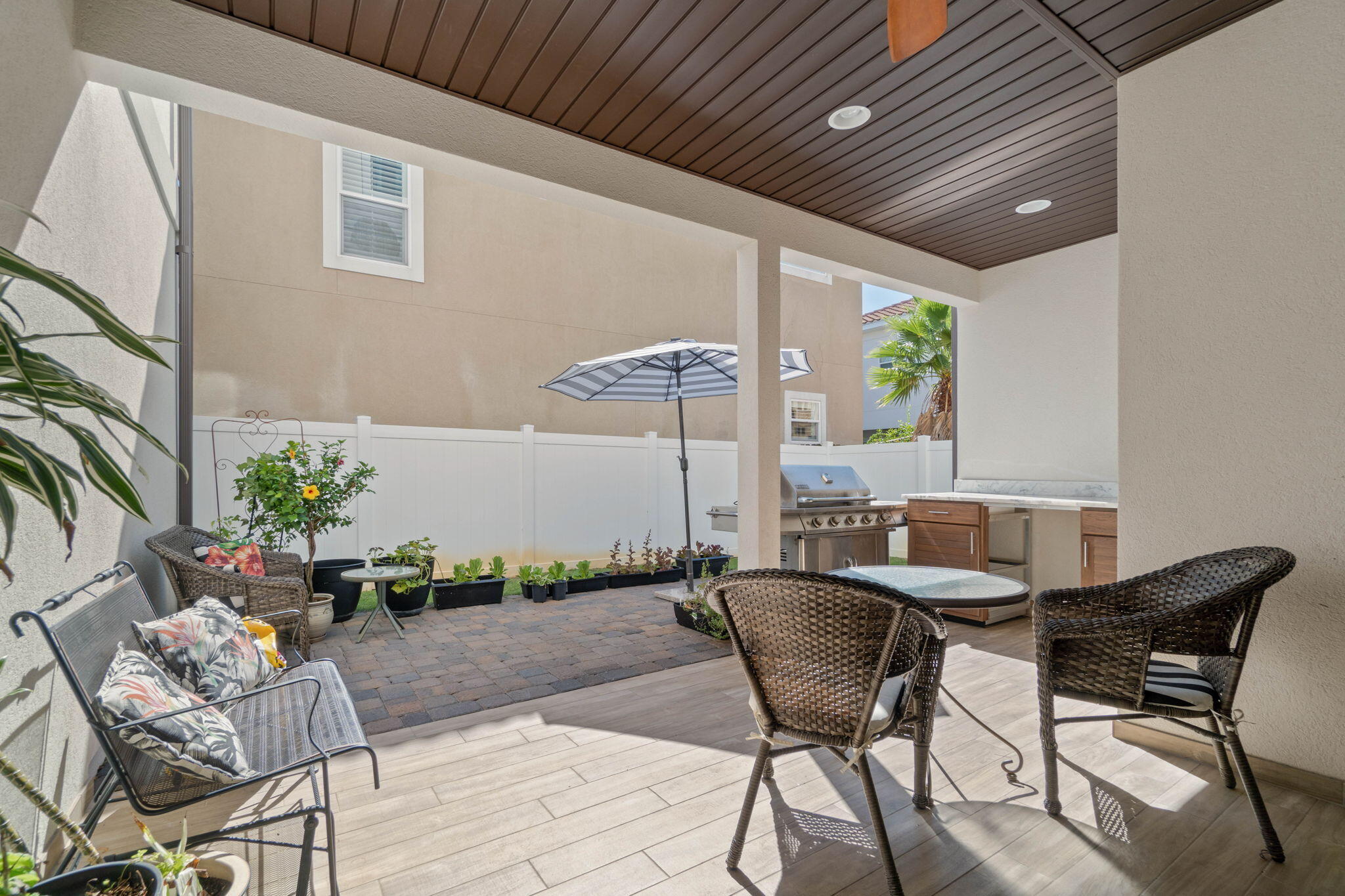 234 Inverrary Drive Destin, FL 32541 - Photo 44 of 53 a patio with table and chairs