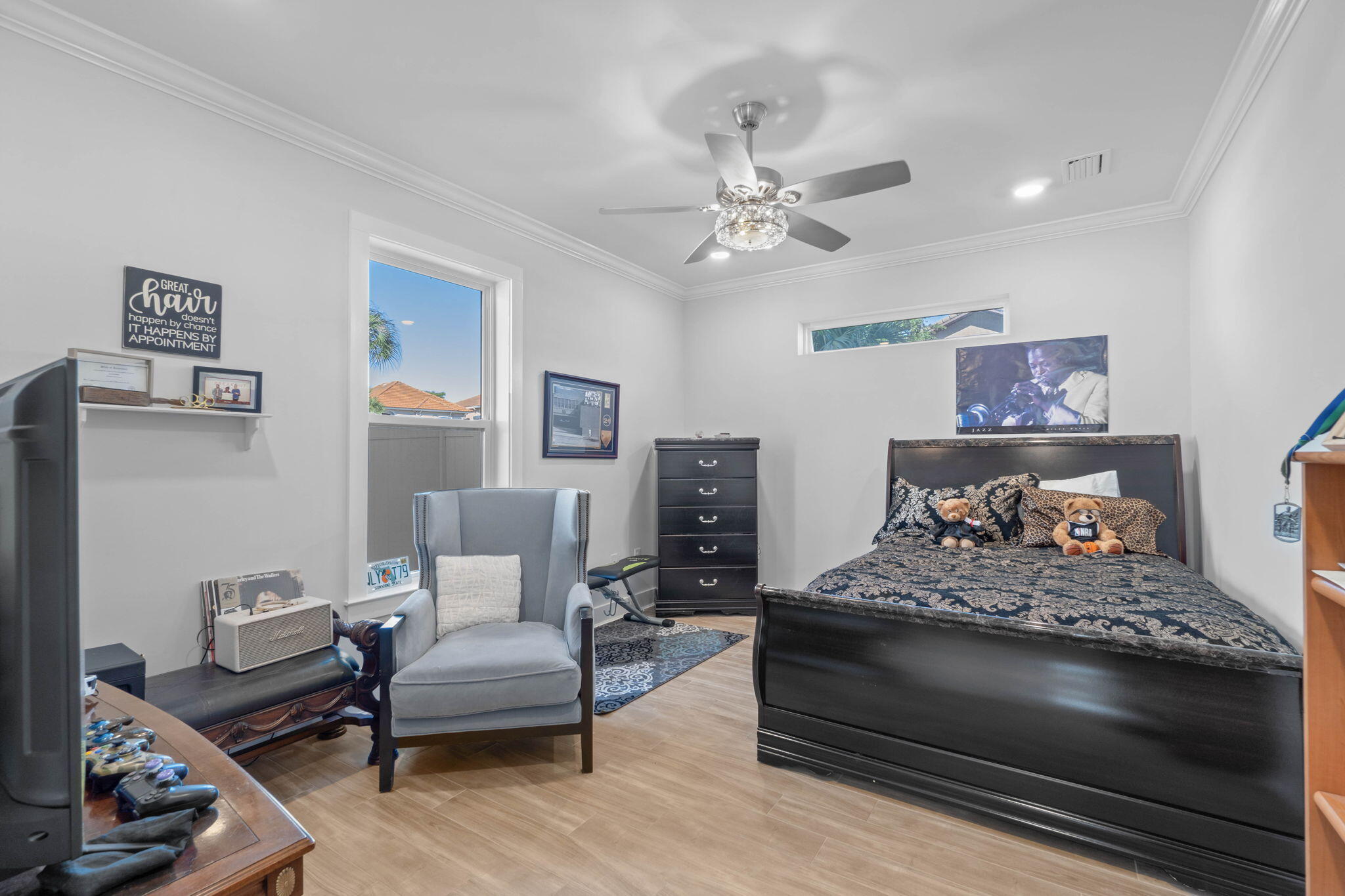 234 Inverrary Drive Destin, FL 32541 - Photo 8 of 53 a bedroom with a bed and wooden floor