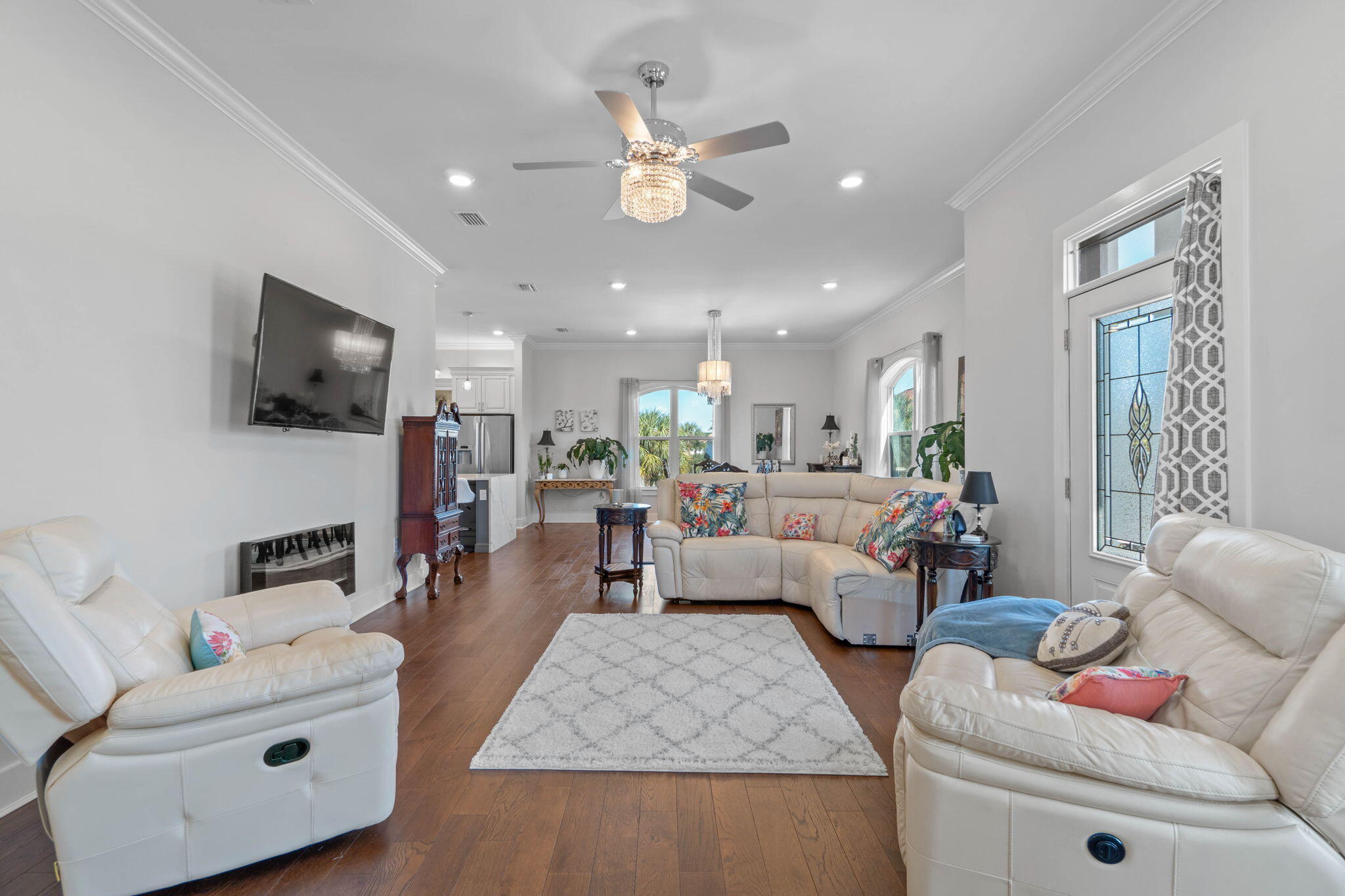 234 Inverrary Drive Destin, FL 32541 - Photo 9 of 53 a living room with furniture and a flat screen tv