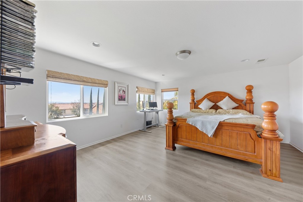 34138 Amici Street Temecula, CA 92592 - Photo 20 of 45 a living room with furniture and a window
