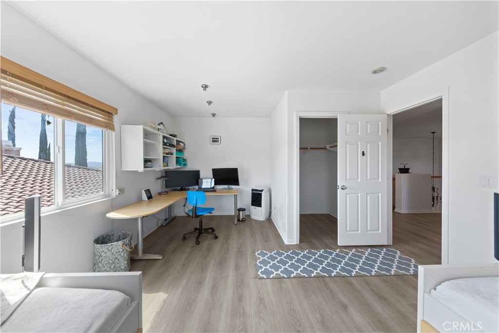 34138 Amici Street Temecula, CA 92592 - Photo 26 of 45 a living room with furniture and a rug
