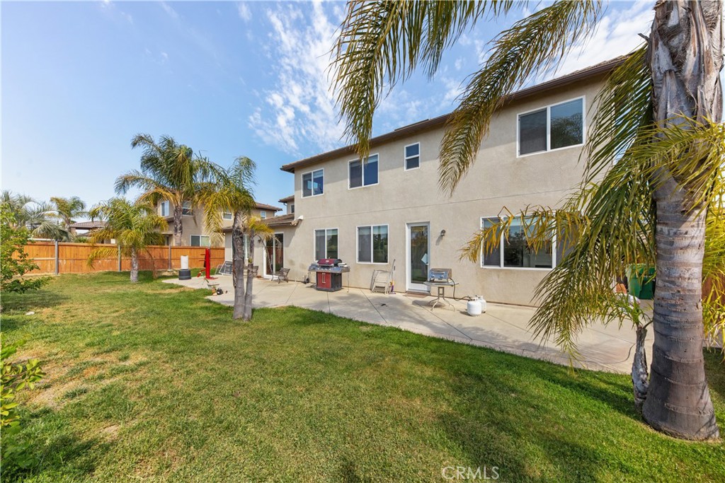 34138 Amici Street Temecula, CA 92592 - Photo 34 of 45 a view of a house with a yard